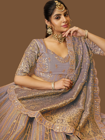 Onion pink bridal lehenga in net tissue with jacquard silk dupatta