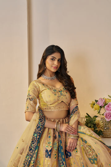 Sunny yellow Banarasi silk lehenga for joyful celebrations