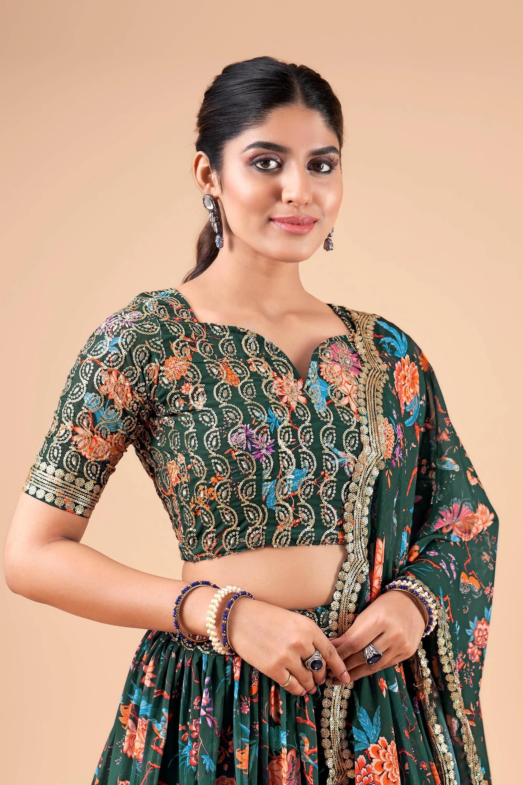 Bottle Green Floral Kalamkari Faux Georgette Lehenga Set with Zari Border