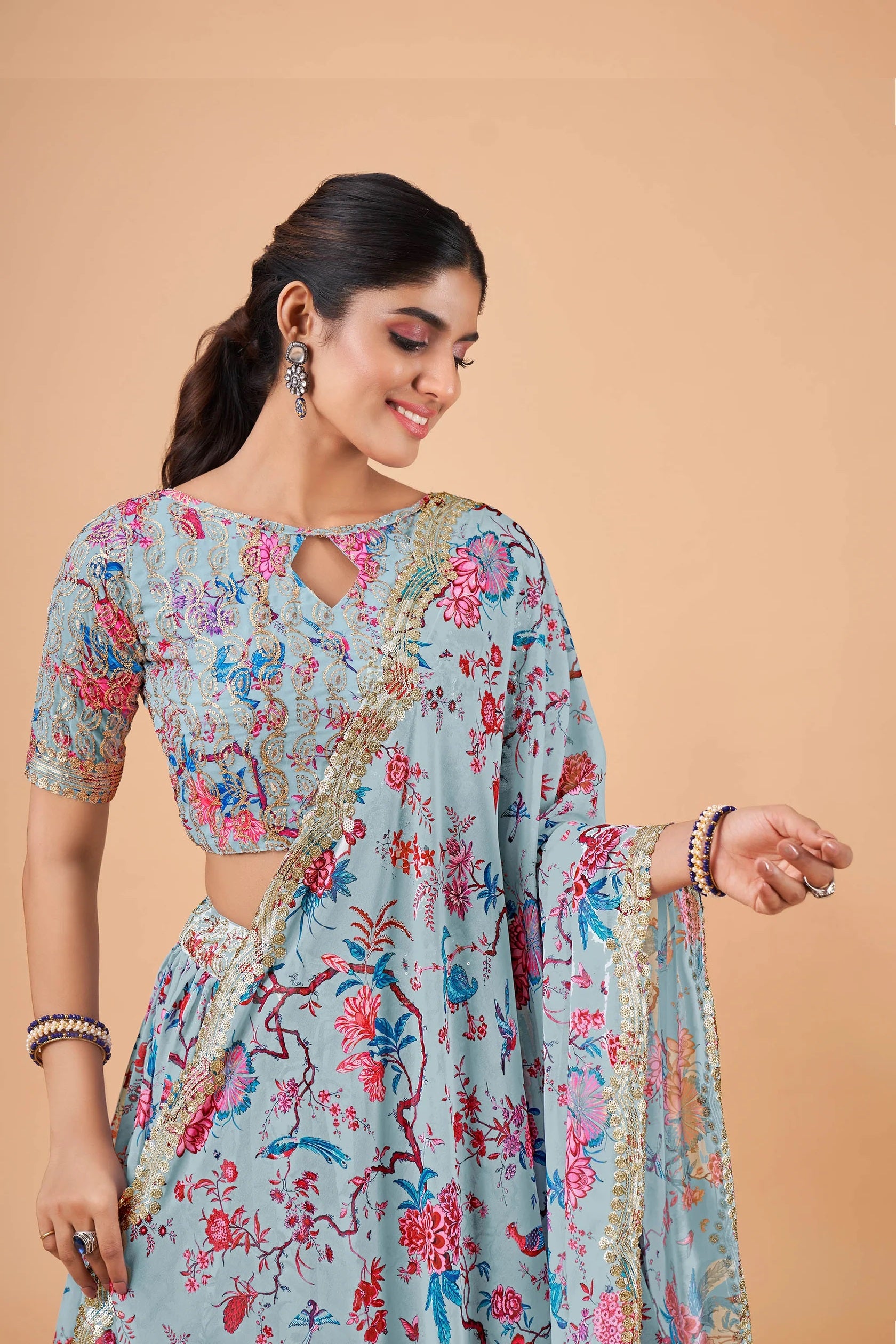 Sky Blue Floral Kalamkari Faux Georgette Lehenga Set with Zari Border