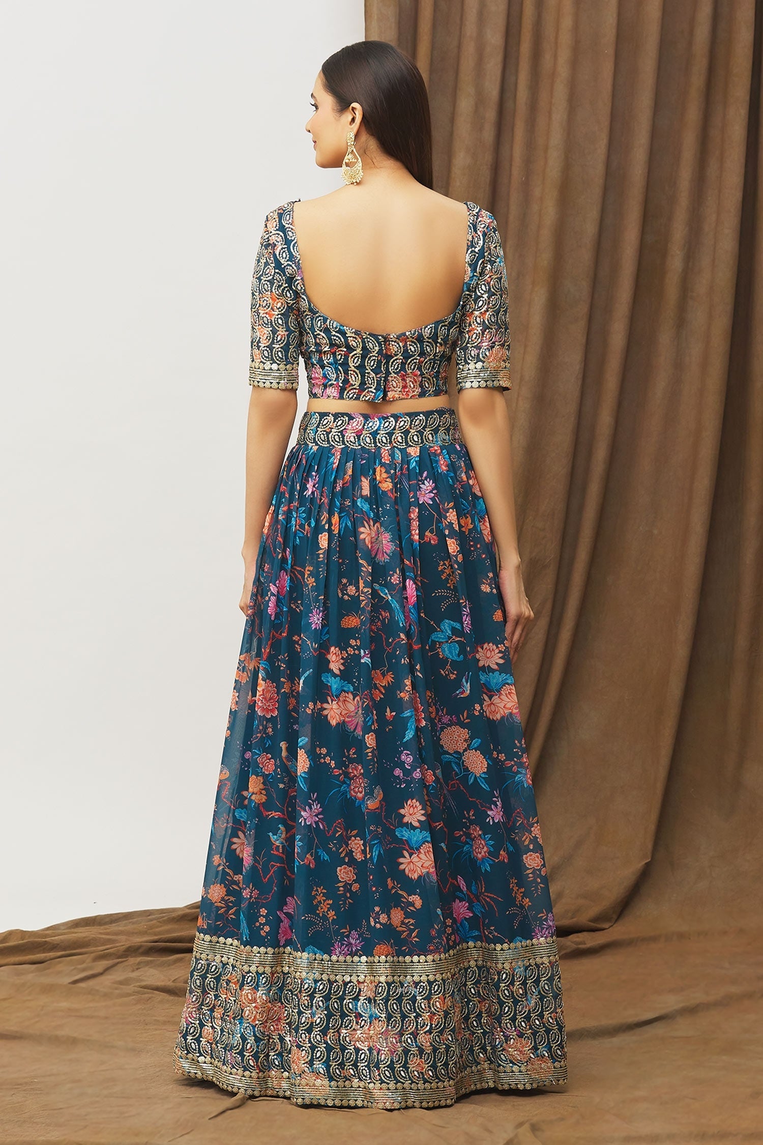 Navy Blue Floral Kalamkari Faux Georgette Lehenga Set with Zari Border