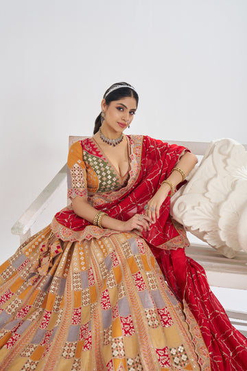 Mustard Dola silk lehenga with soft chinnon dupatta for festive grace