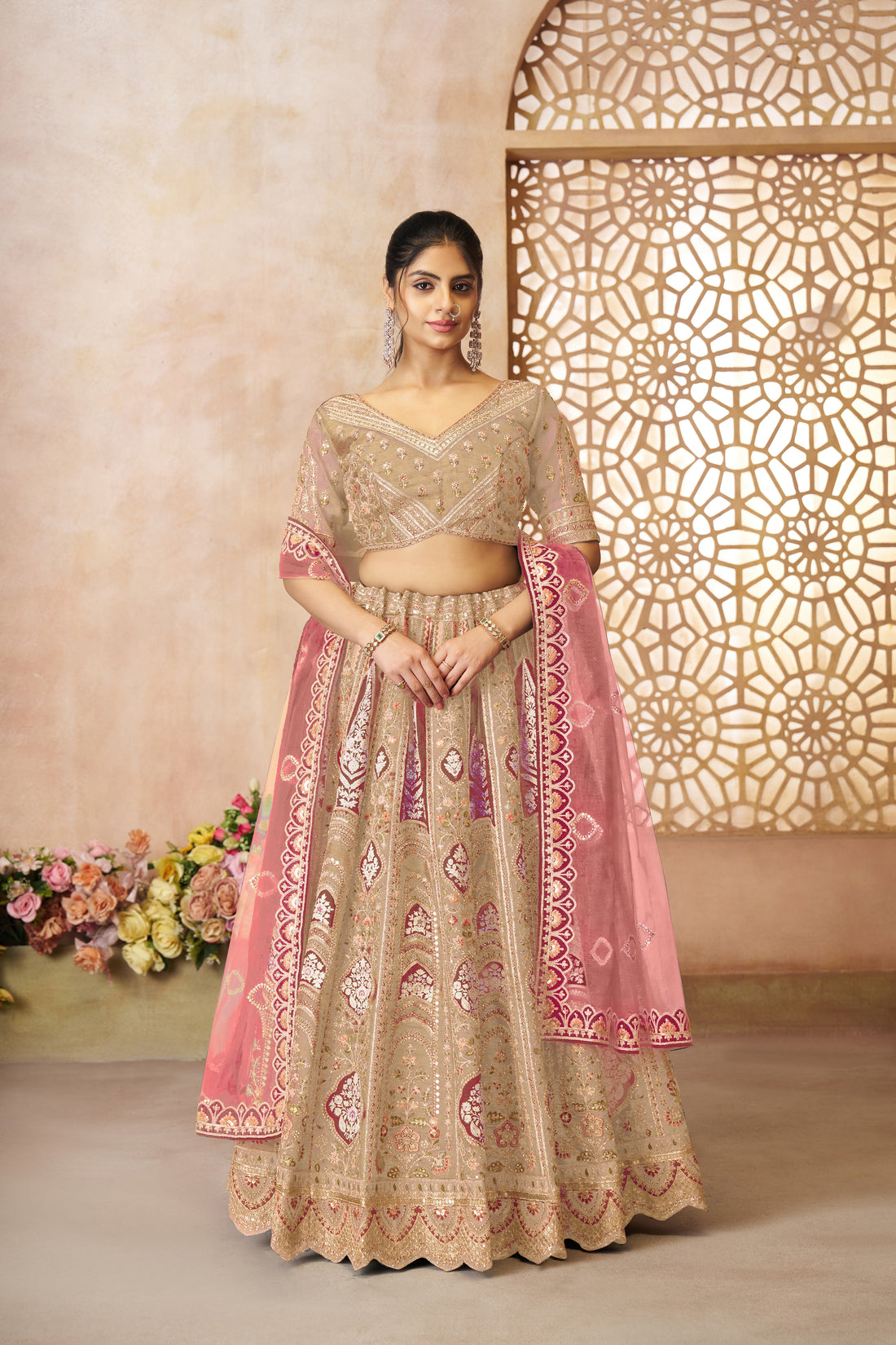Subtle chiku tone lehenga with rich Banarasi silk elegance