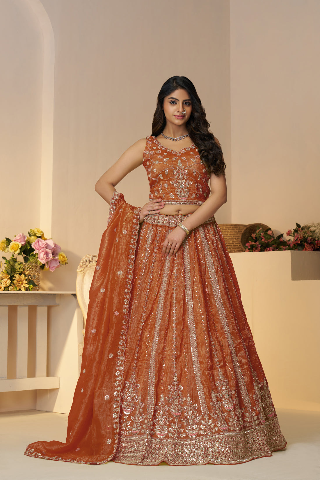 Orange Jimmy Choo lehenga for bold festive flair