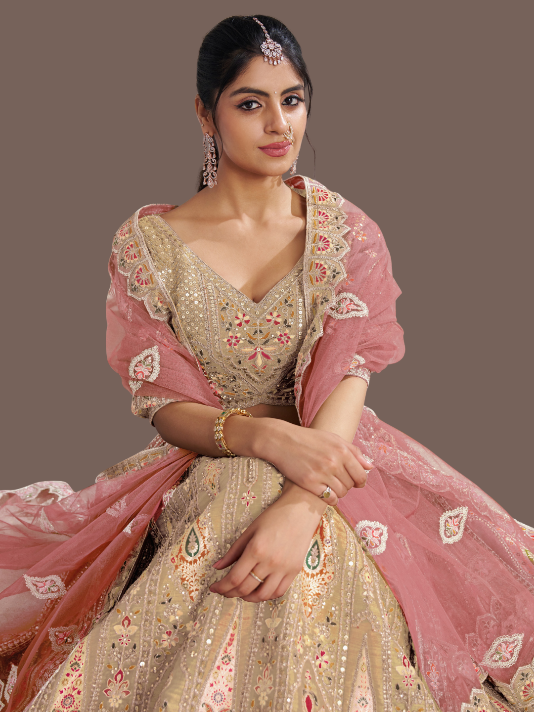 Graceful chiku lehenga in Banarasi silk for ethnic sophistication