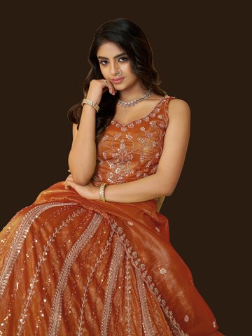 Orange Jimmy Choo lehenga for bold festive flair