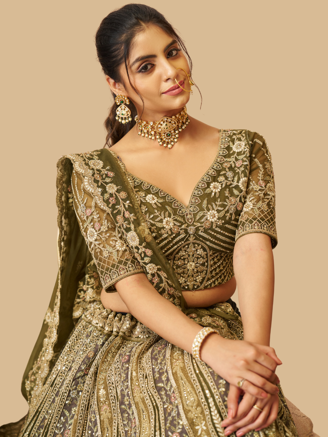 Mehendi green lehenga in soft net for festive charm
