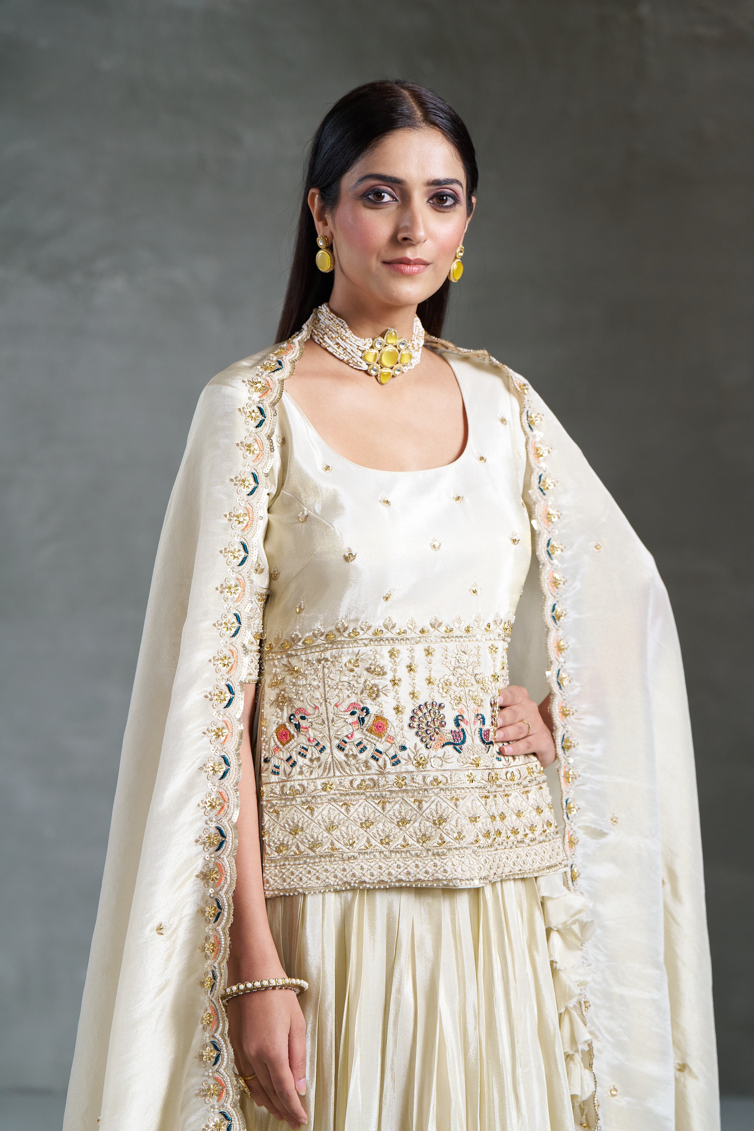 Pure Off-White Viscose Banarasi Tissue Lehenga Choli with Four-Side Embroidered Dupatta